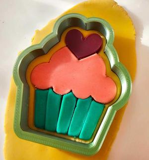 Cookie cutter multicolor cupcake with a heart