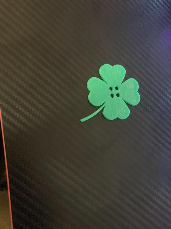 Four leaf clover button