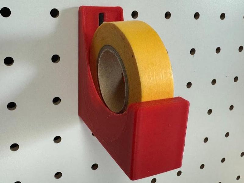Masking tape holder for peg board