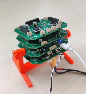 Parametric tilting PCB stand