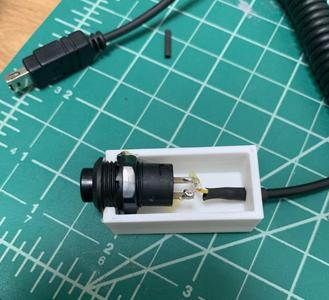 Nikon D Series Auto-shutoff Cable Container