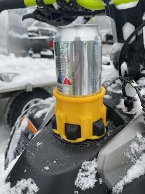 Snowmobile Beverage Holder for Gas Cap.
