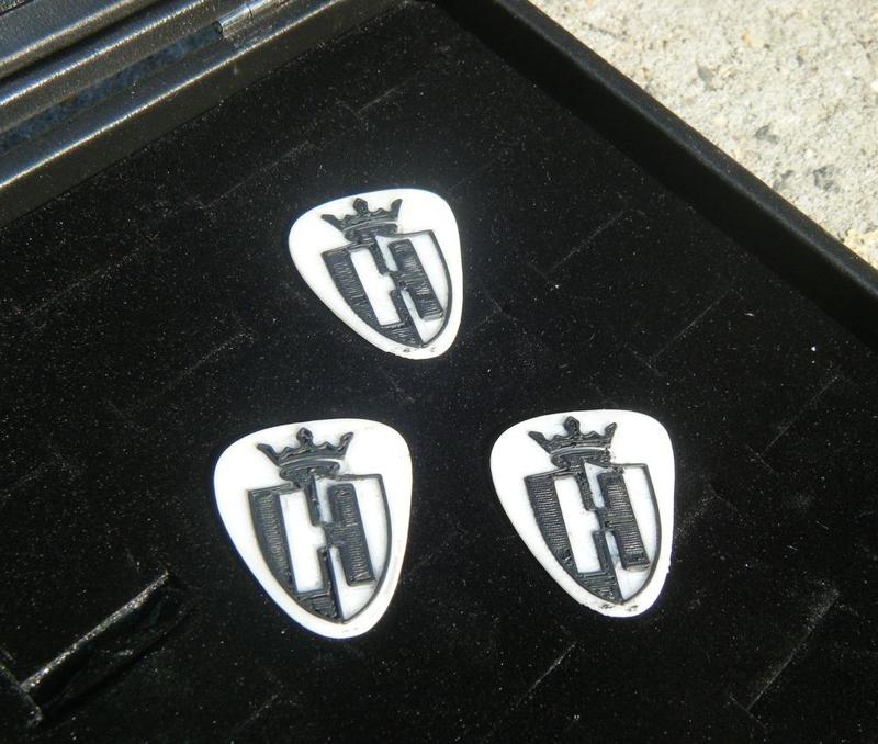 The Hives necklace and guitar pick