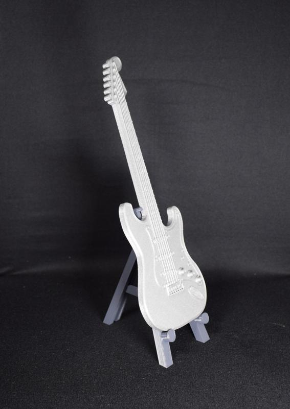 Miniature guitar and its stand