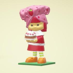 Strawberry Shortcake doll with cake