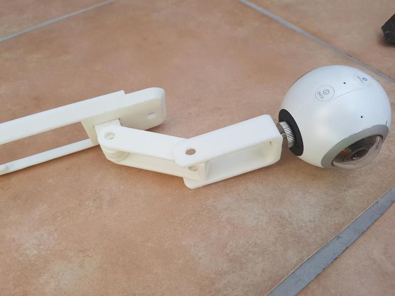 Double pendulum arm for Mavic Pro Camera attachment