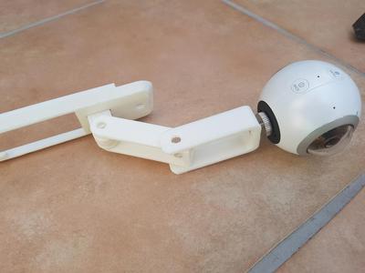 Double pendulum arm for Mavic Pro Camera attachment