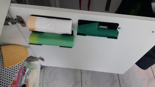 Trash bag roll holder
