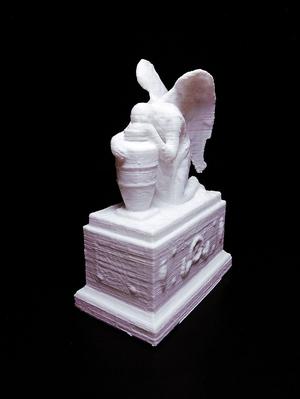 Gravestone Depicting Grieving Angel