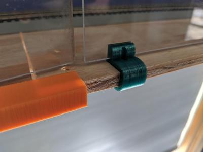 Plexiglass railing holder for plywood.