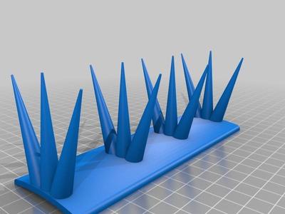 Bird Spikes for a Curved Ridge Tile