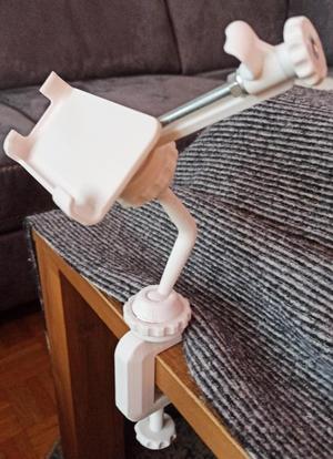 Universal phone holder, mounting system 