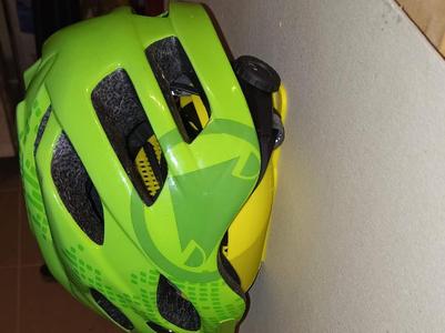 Helmet holder with hidden organizer