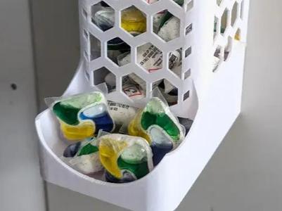 Dishwasher tablet dispenser with lid