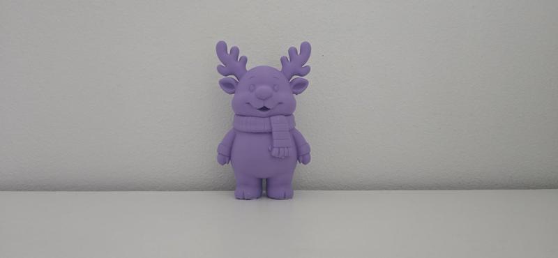 Smiling Reindeer with Scarf Christmas Figurine