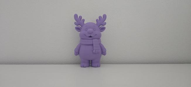 Smiling Reindeer with Scarf Christmas Figurine