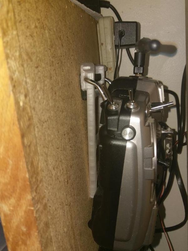 Low profile RC transmitter wall hanger