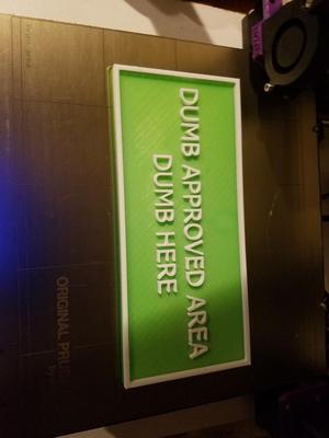 Dumb Here sign