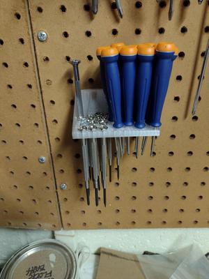 Small parts/screwdriver pegboard holder