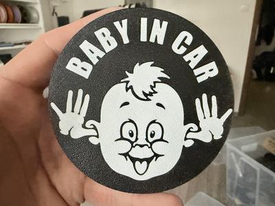 Baby in car coaster
