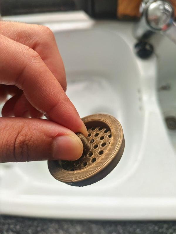 Reinforced sink strainer