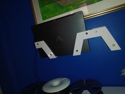 Laptop wall holder