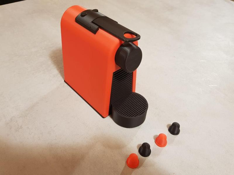 Nespresso toy coffee machine with capsules