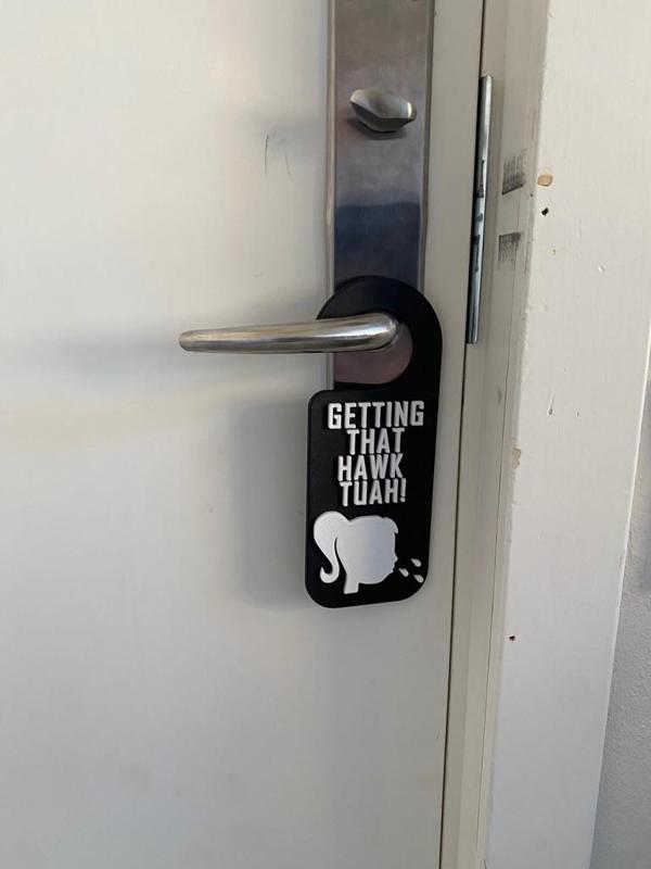 Door sign hawk tuah meme