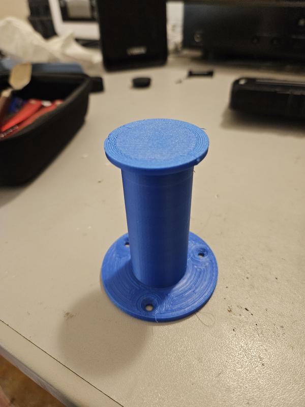 Wall mounted spool holders