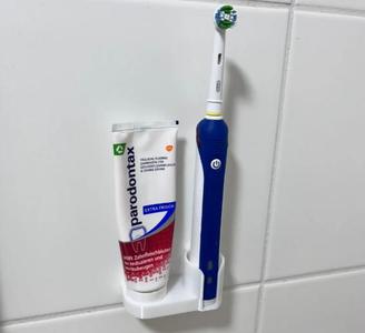 Oral b + toothpaste wall mount