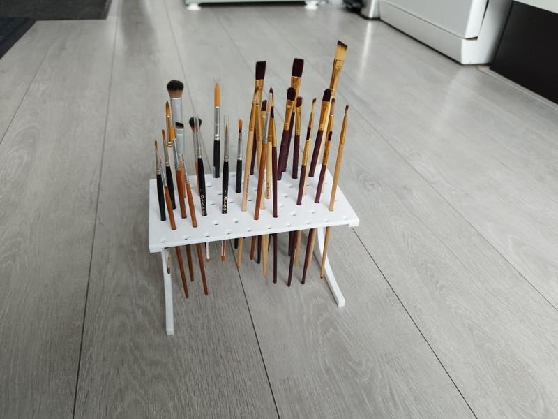 Floating paintbrush holder / stand for miniature painting etc.