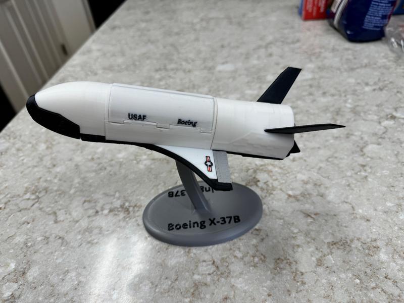 Smaller X-37B with opening PL bay doors