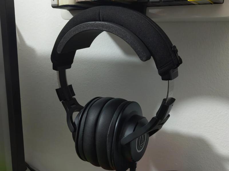 Headphone stand under books