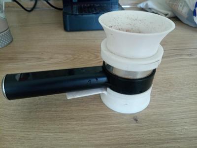 Funnel dispenser arm of Gran Gaggia coffee maker machine