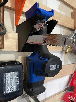 French cleat reciprocating saw bracket with blade storage