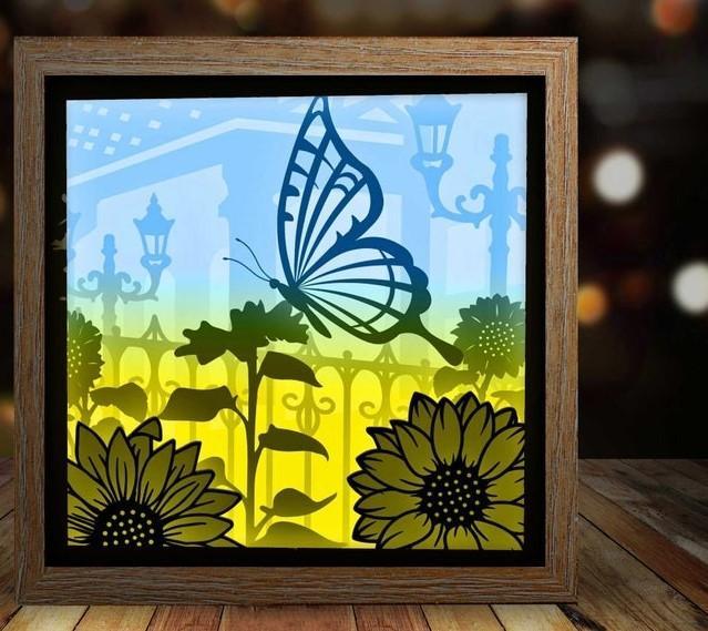 Butterfly and Sunflower in the garden light box 