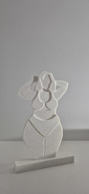 Curvy girl statue