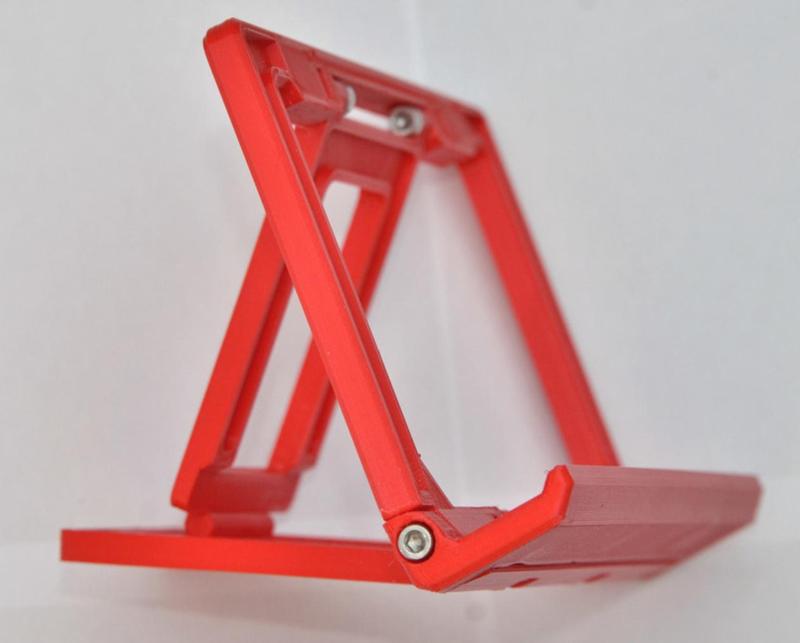 Foldable tilting tablet/phone stand