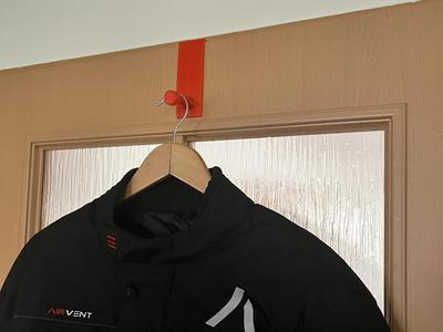 Clothes hanger on door