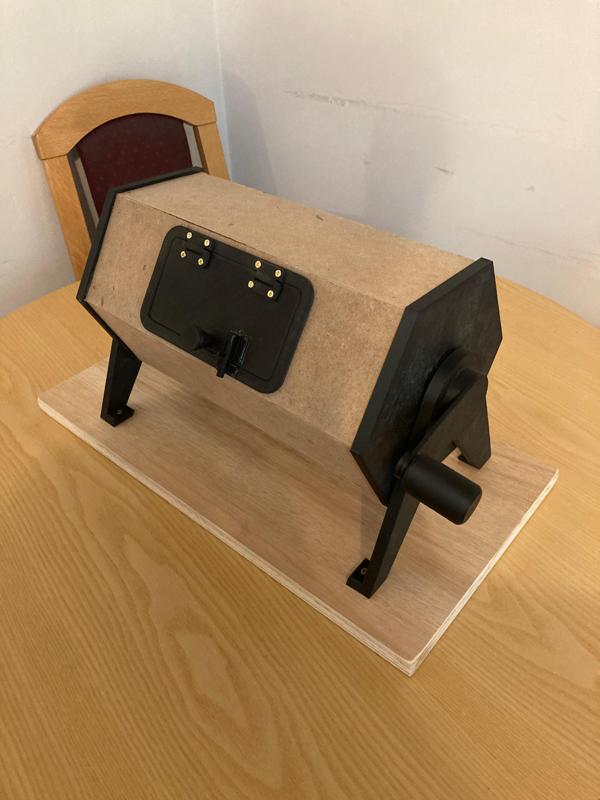 Adjustable sized tombola machine