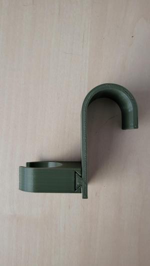 Mop or broom holder for radiator - bathroom
