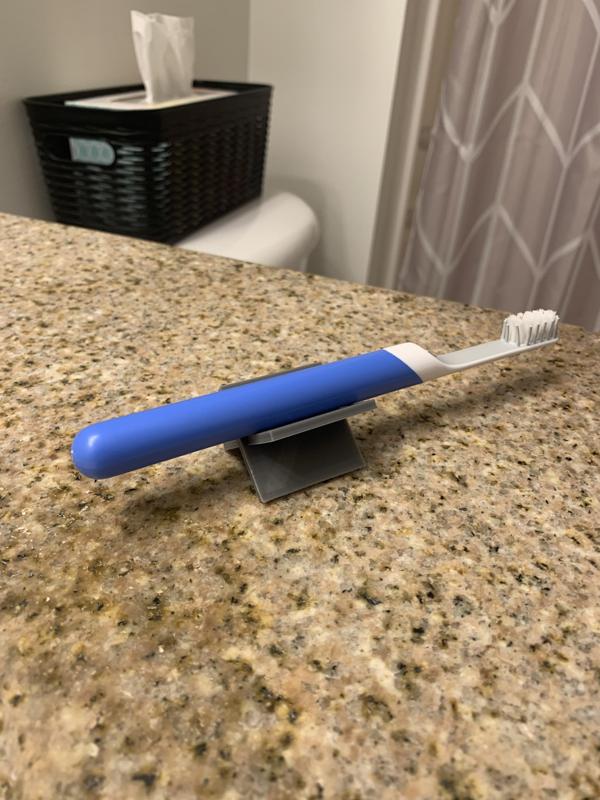 X Shaped Brush Holder- The two-piece toothbrush holder