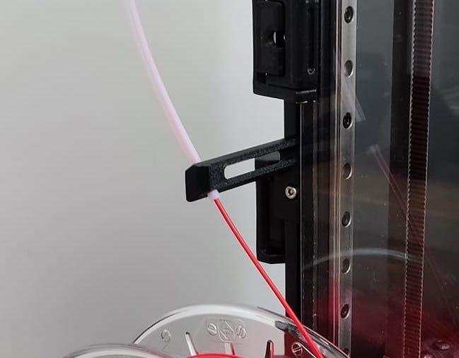 Angled bowden tube holder