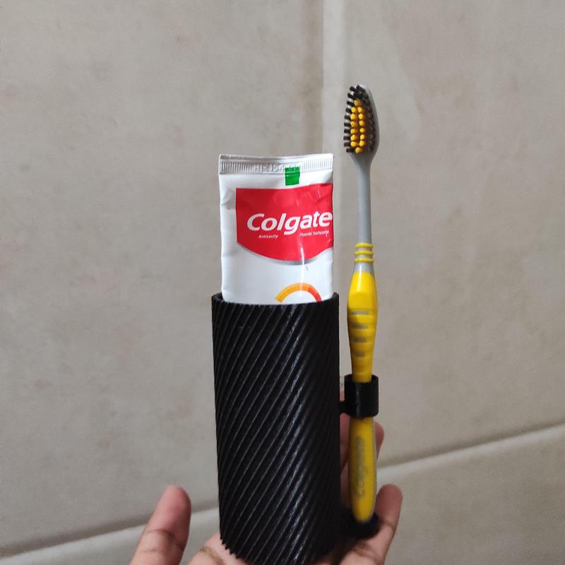 Tooth brush and paste holder