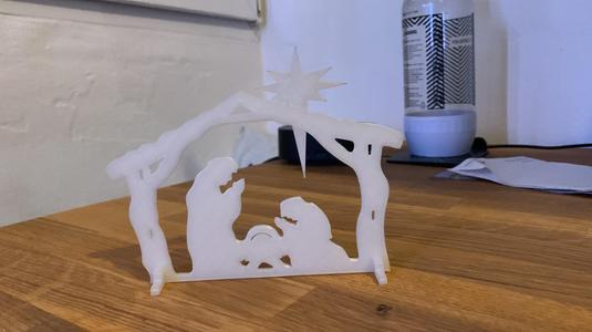 T-Rexes fighting over table saw a.k.a. Born of Jesus