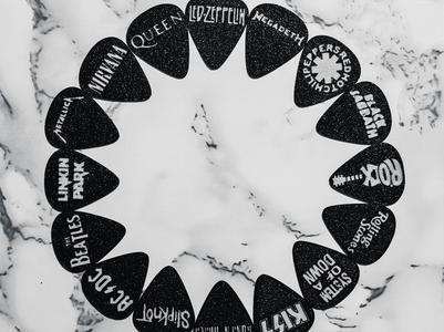 Guitar picks with band names