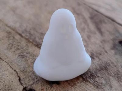 Halloween ghost in criss cross pose