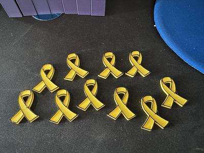 Yellow ribbon pin