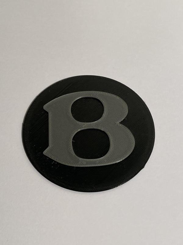 Bentley badge for wheel chock