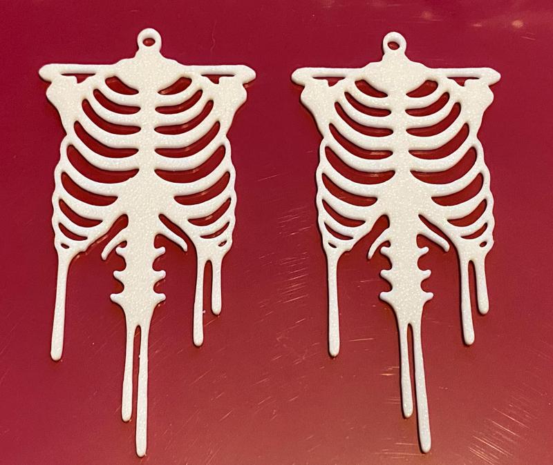 Rib cage earrings with Drip